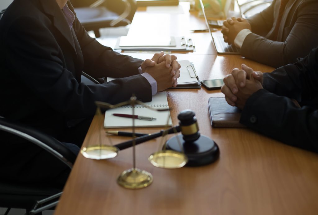 Legal team having a discussion at a table